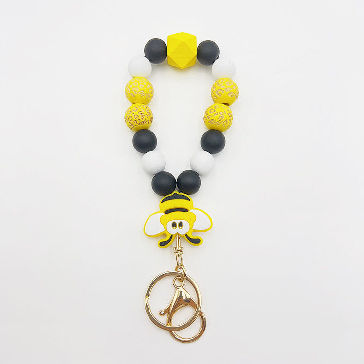 Wholesale Silicone Pumpkin Cow Ghost Dog Paw Wooden Bead Bracelet Keychain
